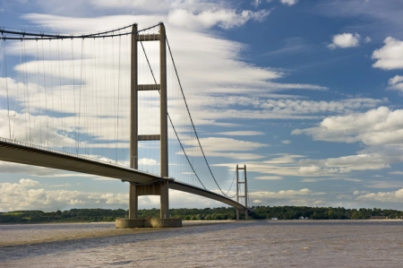 A view of the iconic Humber Bridge in England seen from the south bank of the River Humber.