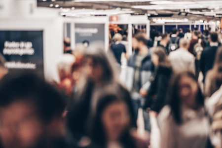 Abstract blurred people at exhibition hall of expo event trade show. Business convention show or job fair. Business concept background